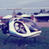 Ray Wijewardene takes a friend flying in his home-built two-seater helicopter at Ratmalana Airport, Sri Lanka. Circa 1992.